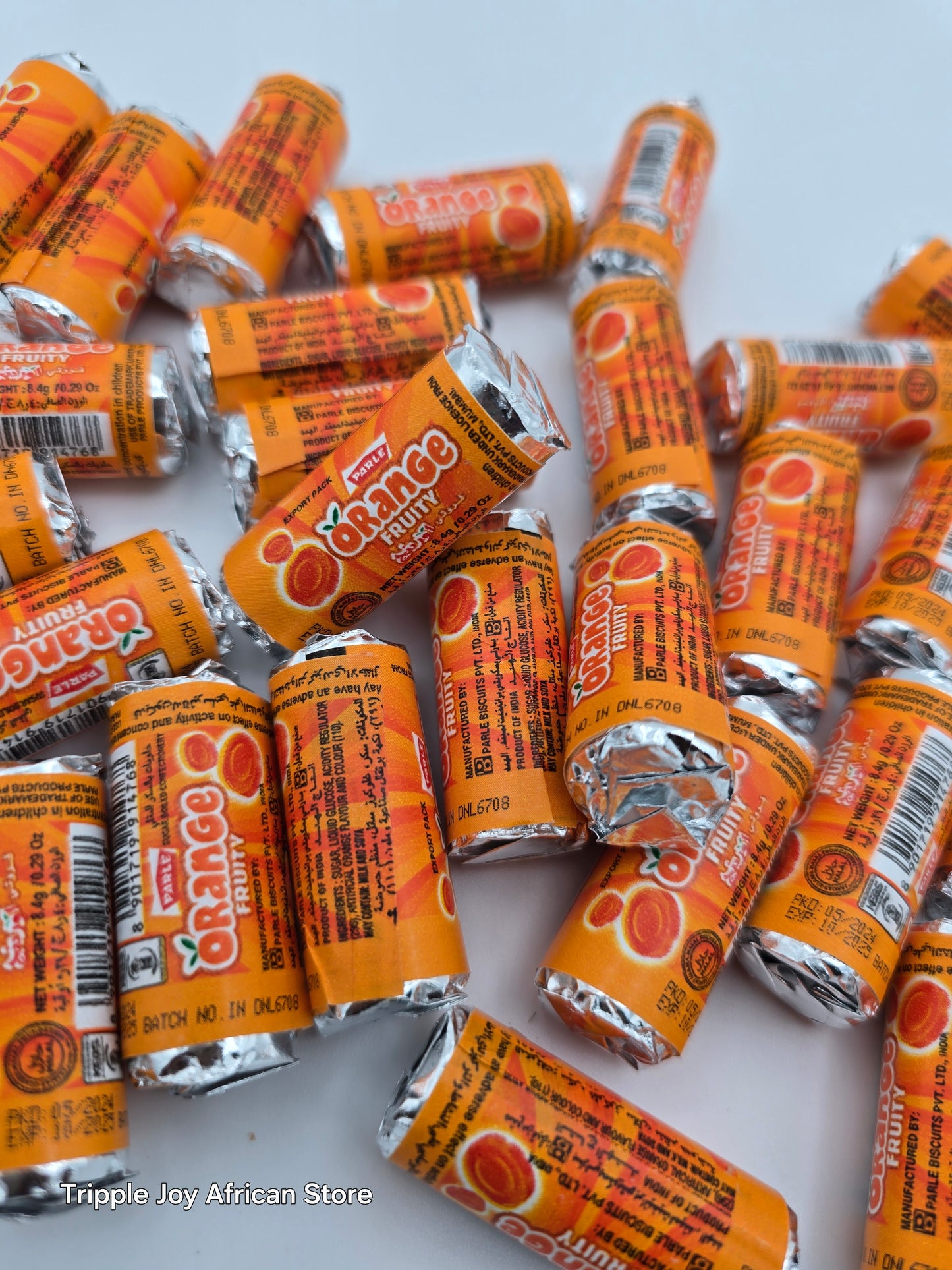 Parle cola and orange candy